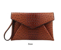 Croc texture envelope clutch with chain